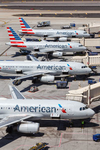 High angle view of airplane on airport runway