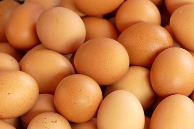 Full frame shot of eggs for sale at market stall