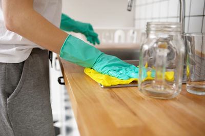 Close-up of woman working on table