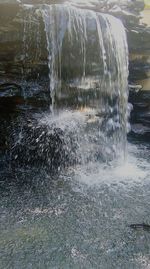 Water splashing on rocks