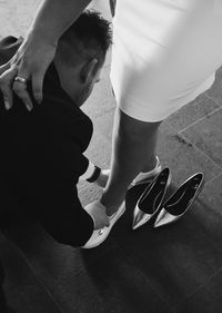 Low section of people standing on floor