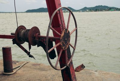 Close-up of metal structure in sea