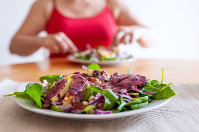 Close-up of salad in plate on table