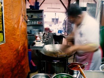 Man preparing food in kitchen