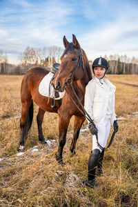 Horse standing on field