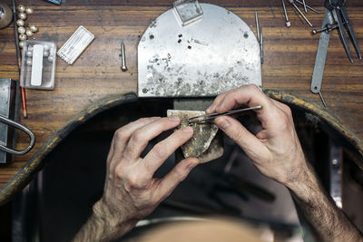 High angle view of man working on table