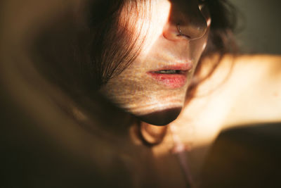 Close-up midsection of woman wearing nose ring