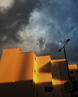 Low angle view of modern buildings against sky