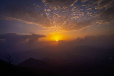 Scenic view of dramatic sky during sunset