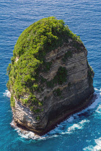 High angle view of rock formation in sea