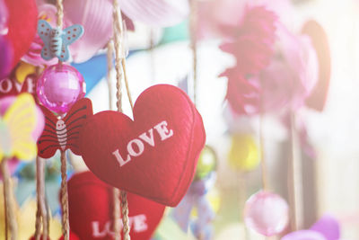 Close-up of heart shape hanging at market stall