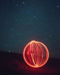 Light trails in sky at night