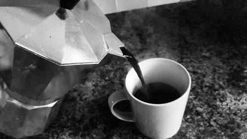 Close-up of coffee cup on table