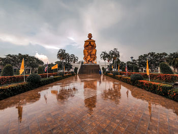 Statue of liberty against sky during rainy season