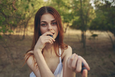 Young woman talking on phone