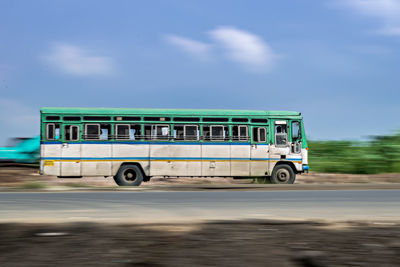 View of bus on road against sky