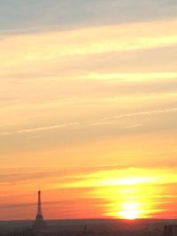 Scenic view of sunset against sky