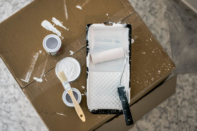 High angle view of coffee cups on table