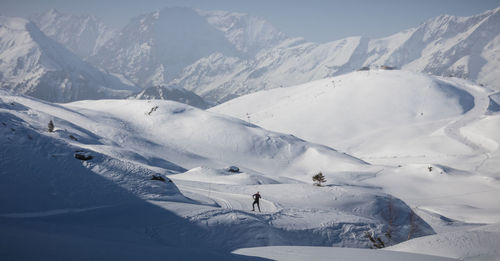 Cross-country skiing at the resort of alpe d'huez in the middle of the snowy mountains  in france