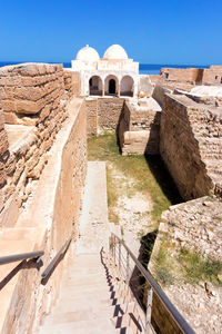 Old ruin building against sky