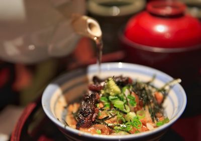 High angle view of grilled eel in bowl on table