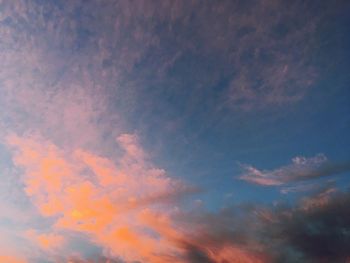 Low angle view of dramatic sky during sunset