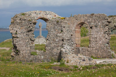 Old ruins of building on field