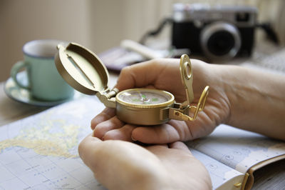 Close-up of hands working on table