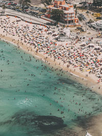 High angle view of crowd at beach in city