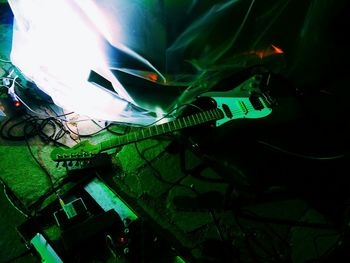 High angle view of illuminated lighting equipment on wall
