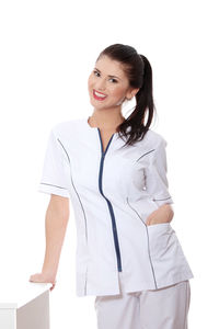 Portrait of a smiling young woman over white background