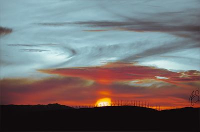 Scenic view of silhouette trees against sky during sunset