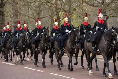 Group of people riding horses