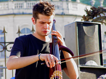 Young man playing guitar