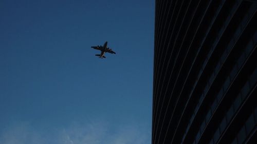 Low angle view of skyscrapers against sky