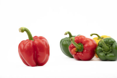 Close-up of bell peppers against white background