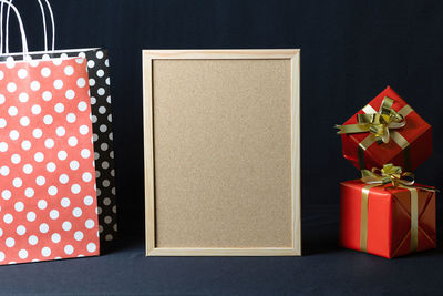 High angle view of box on table against black background