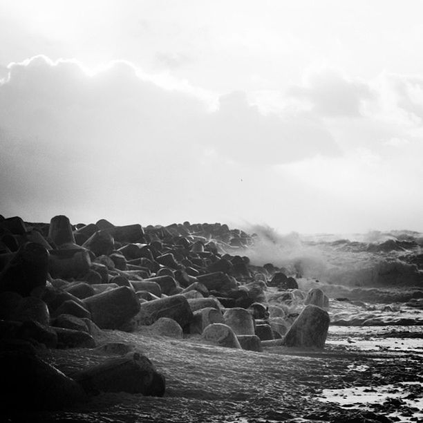 water, rock - object, sea, scenics, beauty in nature, rock formation, tranquil scene, sky, tranquility, nature, horizon over water, rock, idyllic, cliff, wave, beach, non-urban scene, geology, remote, shore