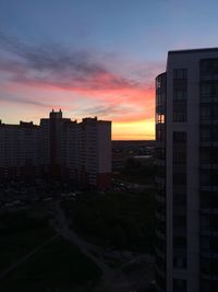 Cityscape against sky during sunset