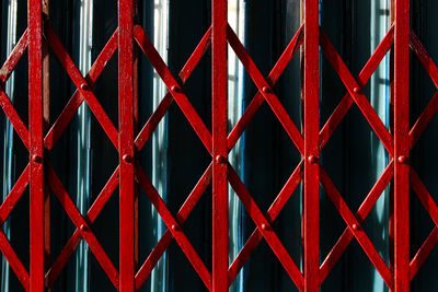 Full frame shot of red metal gate