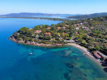 Aerial view of the argentario coast, in the background the orbetello lagoon.