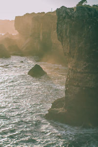 Scenic view of sea and cliff