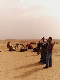 Group of people on desert