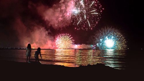 Firework display at night