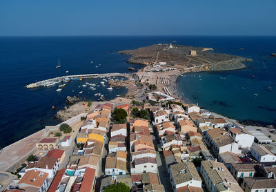 High angle view of sea against clear blue sky