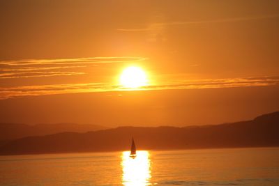 Scenic view of sunset over sea