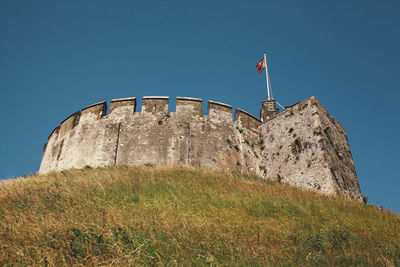 Low angle view of arundel castle against clear sky