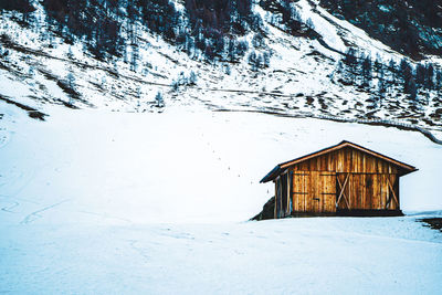 House on snow covered mountain