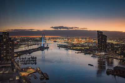 High angle view of city at sunset
