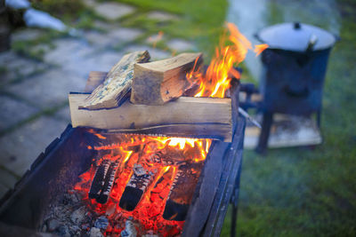 Cooking in a cauldron on the fire. picnic outdoors in summer.